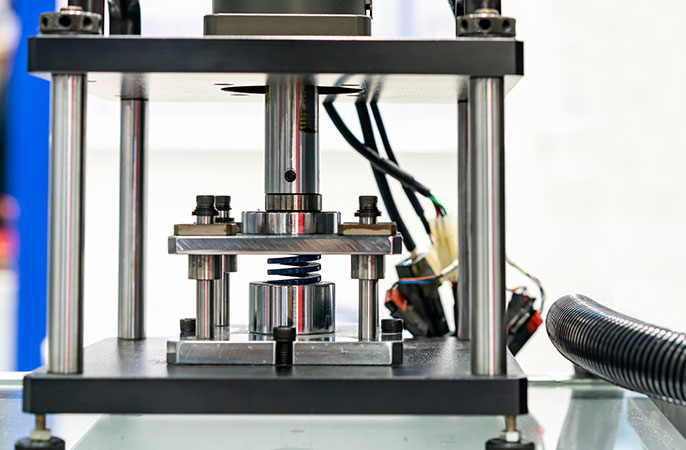 Fatigue testing for compression springs
